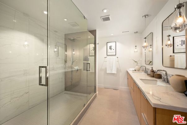Bathroom, Dual Sink Vanities, Glass Shower, Interior, Marble Walls, Pendant Lights, Recessed Lighting