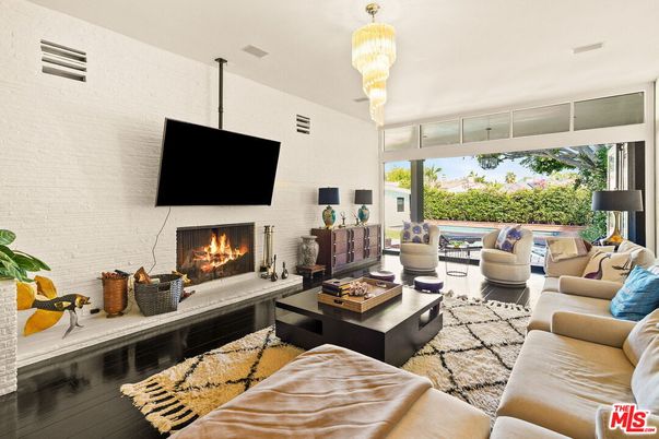 Chandelier, Fireplace, Interior, Living room, Stone Walls