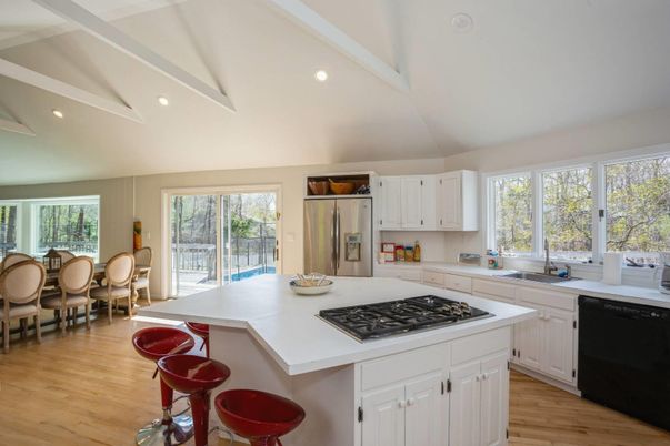 Dining room, Interior, Kitchen, Recessed Lighting, Stainless Steel Appliances, Wood Texture Flooring