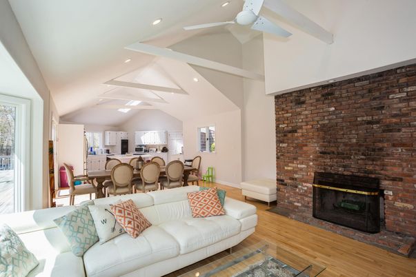 Dining room, Fireplace, Interior, Kitchen, Living room, Recessed Lighting, Stone Walls, Wood Texture Flooring