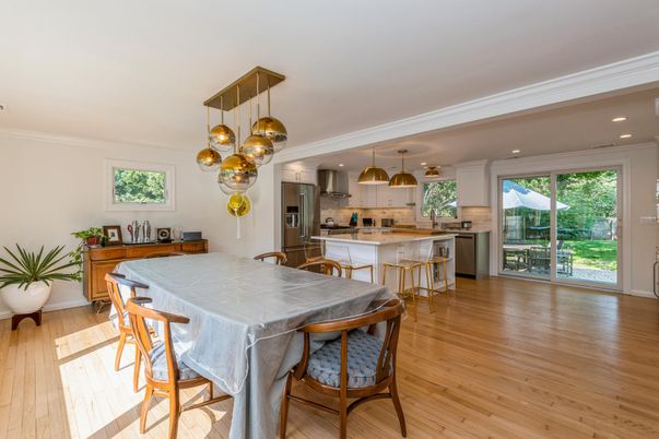 Dining room, Interior, Kitchen, Pendant Lights, Recessed Lighting, Stainless Steel Appliances, Wood Texture Flooring