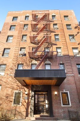 Exterior, Facade, Brick Facade, Condo Building