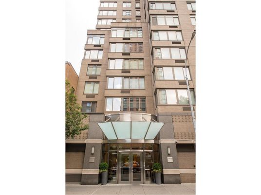 Exterior, Facade, Brick Facade, Condo Building