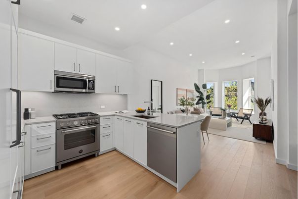 Dining room, Interior, Kitchen, Living room, Recessed Lighting, Stainless Steel Appliances, Wood Texture Flooring