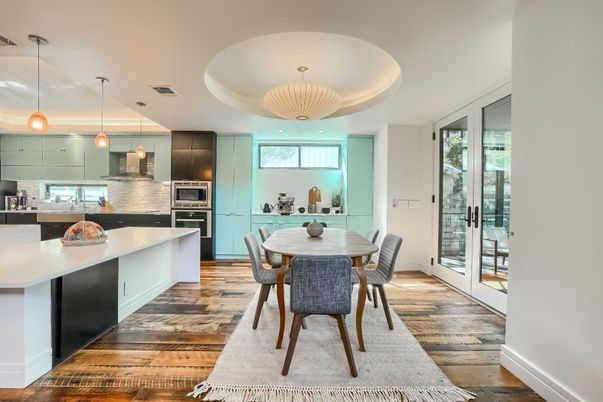 Dining room, Interior, Kitchen, Pendant Lights, Recessed Lighting, Stainless Steel Appliances, Wood Texture Flooring