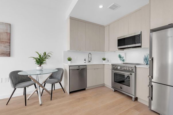 Dining room, Interior, Kitchen, Recessed Lighting, Stainless Steel Appliances, Wood Texture Flooring