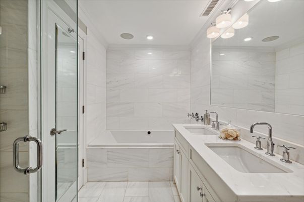 Bathroom, Dual Sink Vanities, Glass Shower, Interior, Marble, Marble Walls, Recessed Lighting