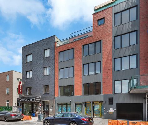 Exterior, Facade, Brick Facade, Condo Building