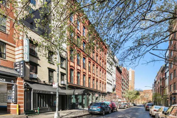 Exterior, Facade, Brick Facade, Condo Building