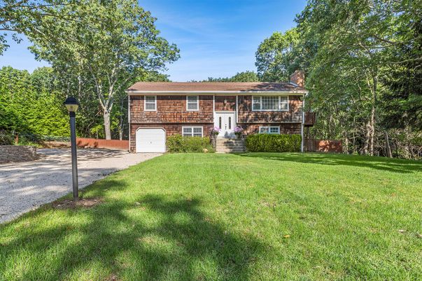 Attached, Backyard, Exterior, Facade, Brick Facade, Raised Ranch
