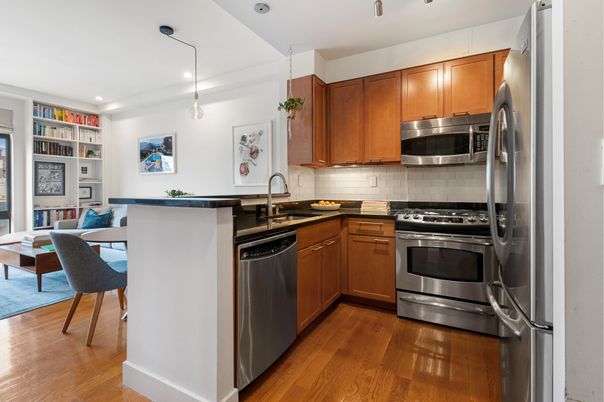 Dining room, Interior, Kitchen, Pendant Lights, Recessed Lighting, Stainless Steel Appliances, Wood Texture Flooring