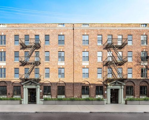 Exterior, Facade, Brick Facade, Condo Building