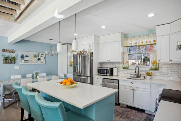Dining room, Interior, Kitchen, Pendant Lights, Recessed Lighting, Stainless Steel Appliances, Wood Texture Flooring