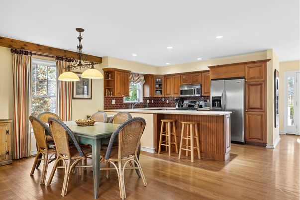 Dining room, Interior, Kitchen, Pendant Lights, Recessed Lighting, Stainless Steel Appliances, Wood Texture Flooring