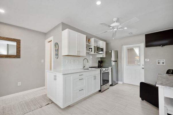 Interior, Kitchen, Recessed Lighting, Stainless Steel Appliances, Wood Texture Flooring