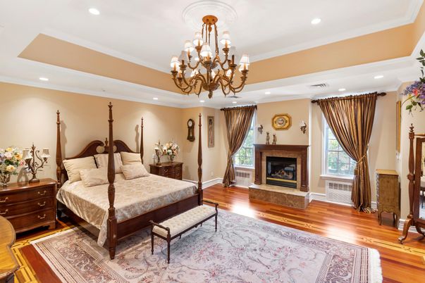 Bedroom, Chandelier, Fireplace, Interior, Recessed Lighting, Wood Texture Flooring