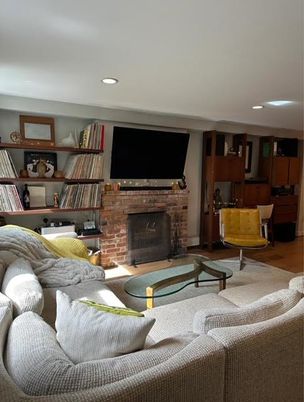 Fireplace, Interior, Living room, Recessed Lighting, Stone Walls, Wood Texture Flooring