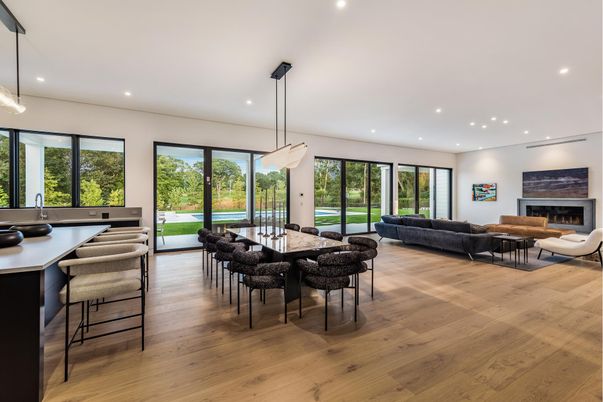 Dining room, Fireplace, Interior, Living room, Pendant Lights, Recessed Lighting, Wood Texture Flooring