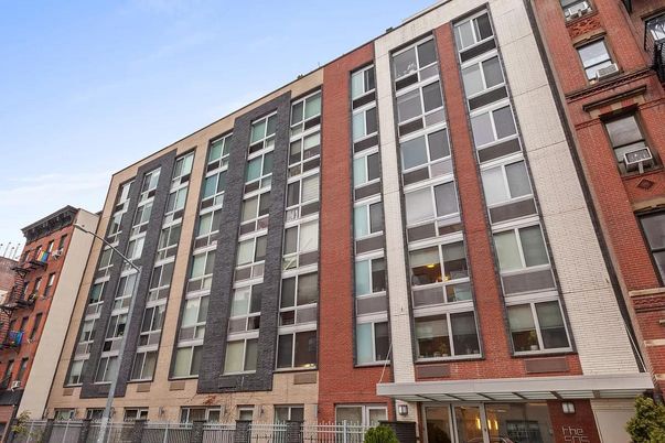 Exterior, Facade, Brick Facade, Condo Building