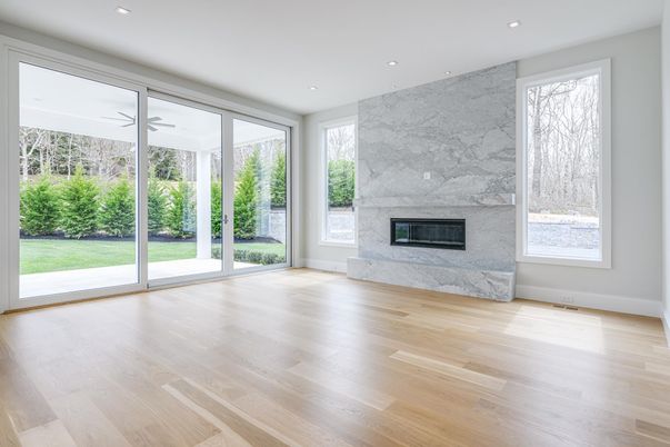 Empty room, Fireplace, Interior, Marble Walls, Recessed Lighting, Wood Texture Flooring