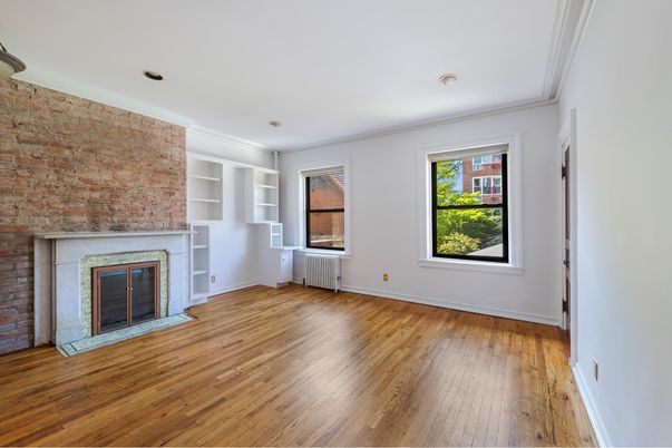 Empty room, Fireplace, Interior, Recessed Lighting, Stone Walls, Wood Texture Flooring