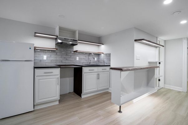 Interior, Kitchen, Recessed Lighting, Stone Walls, Wood Texture Flooring