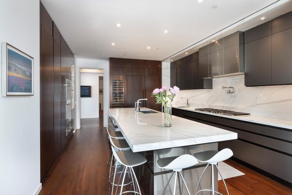 Interior, Kitchen, Marble Walls, Recessed Lighting, Stainless Steel Appliances, Wood Texture Flooring