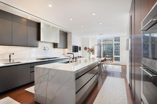 Interior, Kitchen, Marble Walls, Recessed Lighting, Stainless Steel Appliances, Wood Texture Flooring
