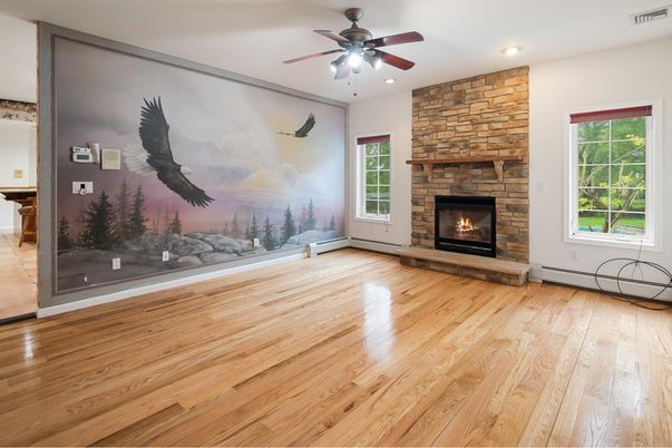 Empty room, Fireplace, Interior, Recessed Lighting, Stone Walls, Wood Texture Flooring