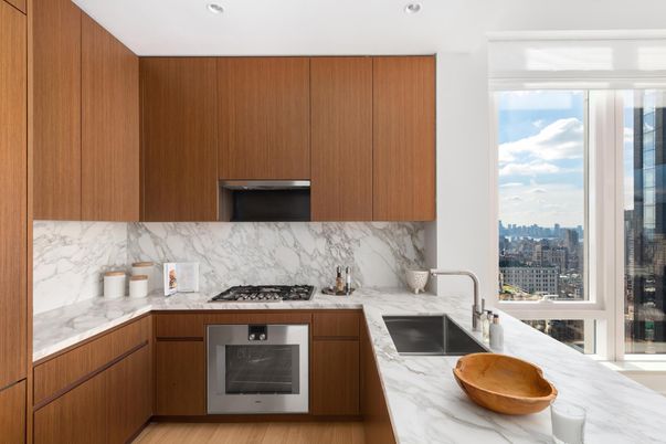 Interior, Kitchen, Marble Walls, Recessed Lighting, Stainless Steel Appliances, Wood Texture Flooring