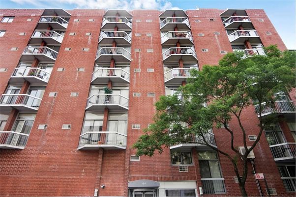 Exterior, Facade, Brick Facade, Condo Building