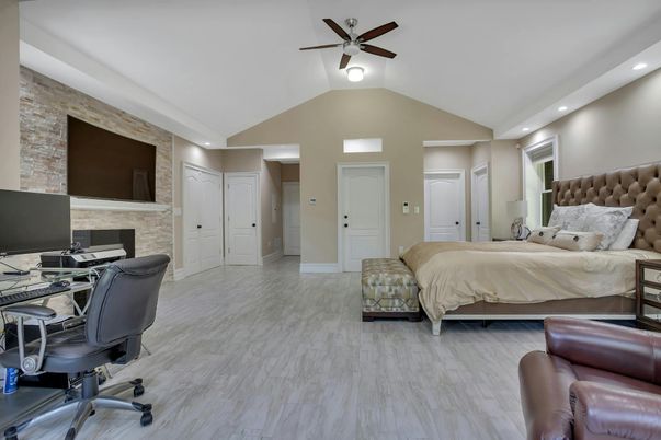 Bedroom, Fireplace, Home Office, Interior, Recessed Lighting, Stone Walls, Wood Texture Flooring