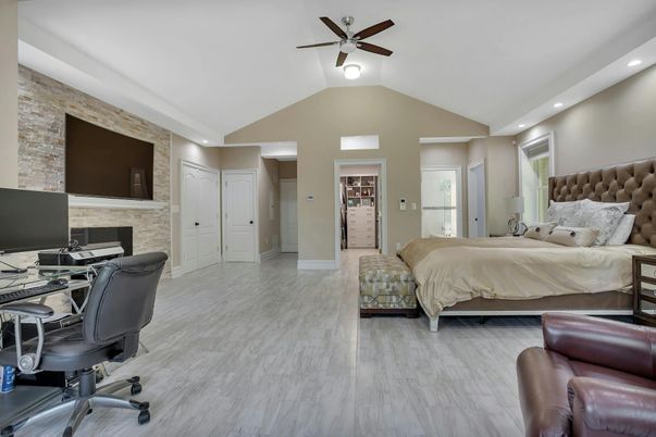 Bedroom, Fireplace, Home Office, Interior, Recessed Lighting, Stone Walls, Wood Texture Flooring