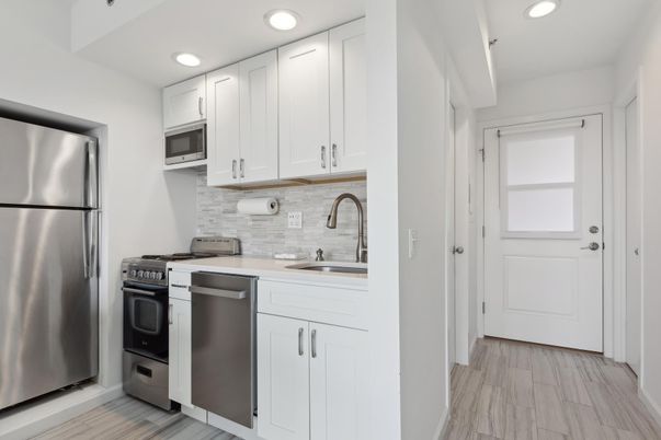 Interior, Kitchen, Recessed Lighting, Stainless Steel Appliances, Wood Texture Flooring