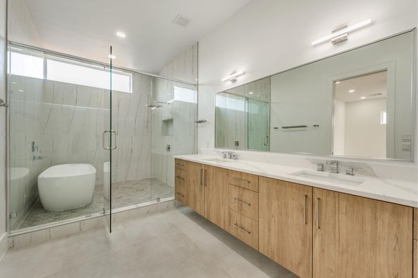 Bathroom, Dual Sink Vanities, Free Standing Baths, Glass Shower, Interior, Marble Walls, Recessed Lighting