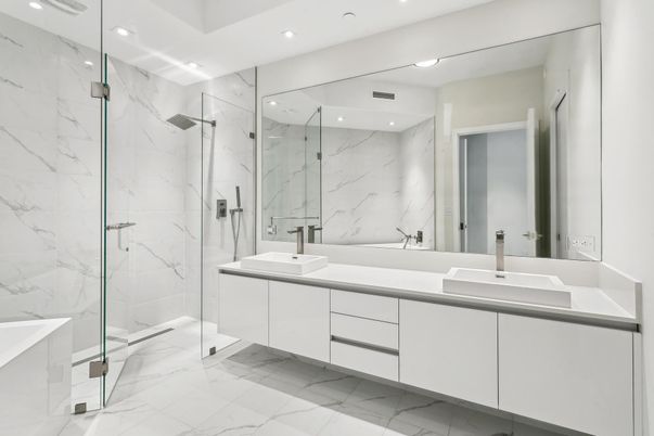 Bathroom, Dual Sink Vanities, Glass Shower, Interior, Marble, Marble Walls, Recessed Lighting