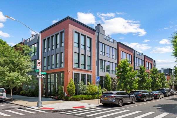 Exterior, Facade, Brick Facade, Condo Building