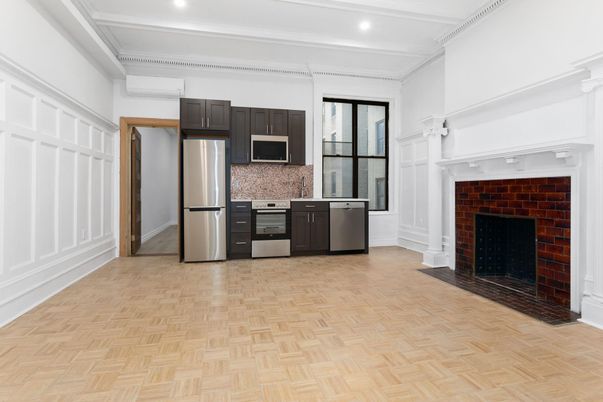 Fireplace, Interior, Kitchen, Recessed Lighting, Stainless Steel Appliances, Stone Walls, Wood Texture Flooring