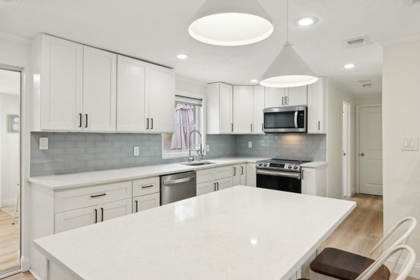 Interior, Kitchen, Pendant Lights, Recessed Lighting, Stainless Steel Appliances, Wood Texture Flooring