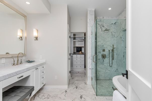 Bathroom, Dual Sink Vanities, Glass Shower, Interior, Marble, Marble Walls, Recessed Lighting