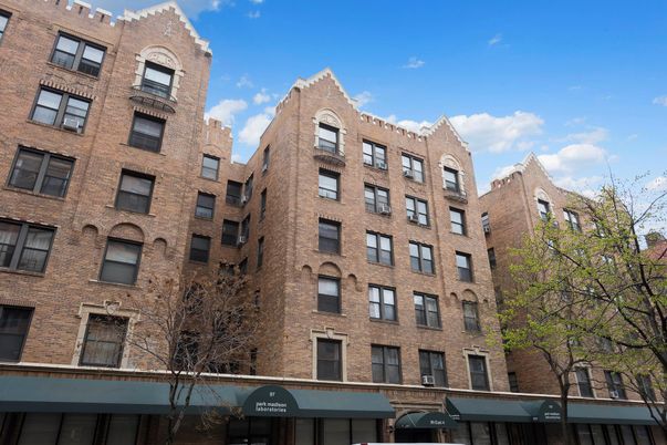 Exterior, Facade, Brick Facade, Condo Building