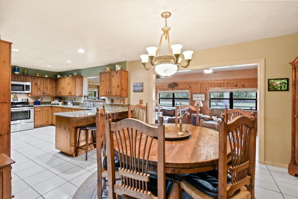 Chandelier, Dining room, Interior, Kitchen, Living room, Recessed Lighting, Stainless Steel Appliances