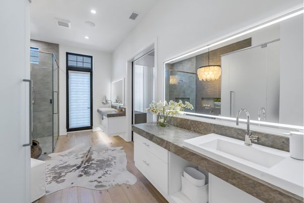 Bathroom, Dual Sink Vanities, Glass Shower, Interior, Pendant Lights, Recessed Lighting, Wood Texture Flooring