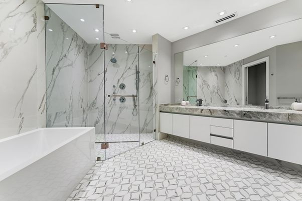 Bathroom, Dual Sink Vanities, Glass Shower, Interior, Marble, Marble Walls, Recessed Lighting