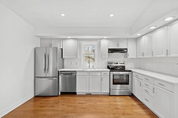 Interior, Kitchen, Recessed Lighting, Stainless Steel Appliances, Wood Texture Flooring