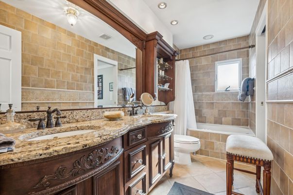 Bathroom, Dual Sink Vanities, Interior, Recessed Lighting, Stone Walls