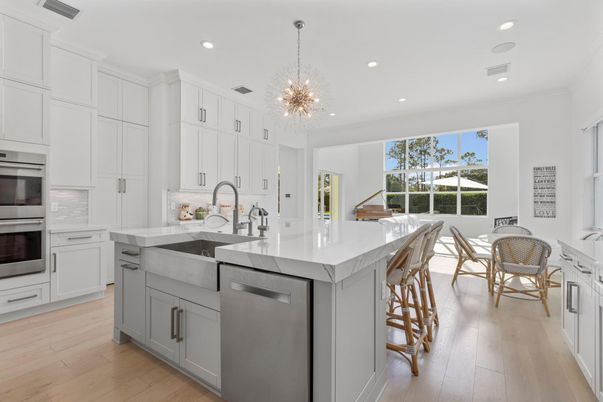 Chandelier, Dining room, Interior, Kitchen, Recessed Lighting, Stainless Steel Appliances, Wood Texture Flooring