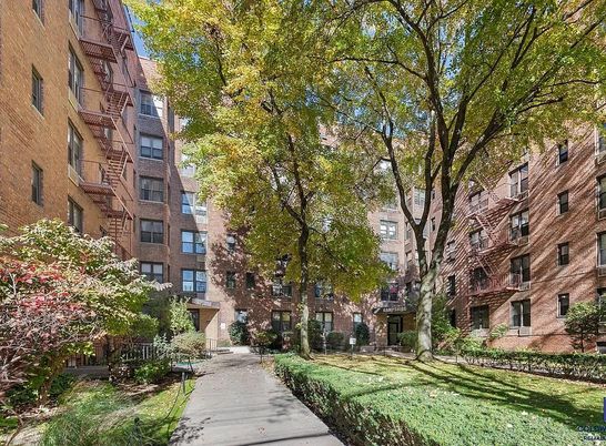 Exterior, Facade, Brick Facade, Condo Building