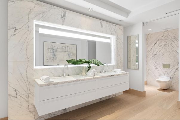 Bathroom, Dual Sink Vanities, Interior, Marble Walls, Recessed Lighting, Wood Texture Flooring