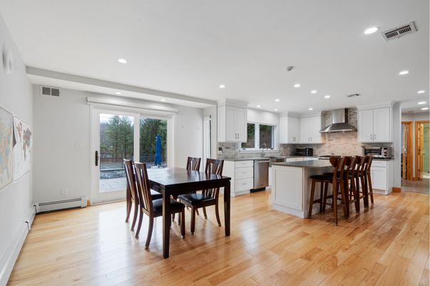 Dining room, Interior, Kitchen, Recessed Lighting, Stainless Steel Appliances, Wood Texture Flooring